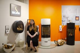 Fire and Stoves Consultant, Emma Bradshaw, pictured in Bell of Northampton's showroom