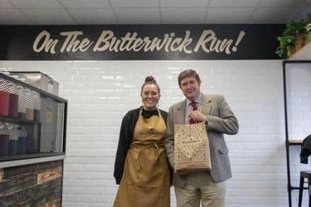 Andrew Lewer MP, who was "heartened" to learn about this campaign and is in support of it, recently visited businesses in the town centre to gauge how they are being impacted by the rising costs the country faces. Here, he is pictured with the manager of the recently opened Butterwick Bakery in St Giles' Street, Annalise Brown.