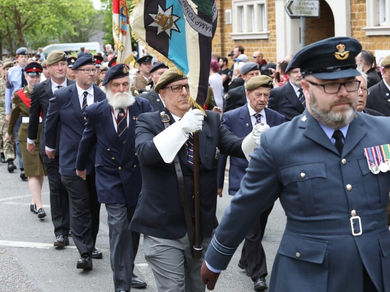Kettering town centre: crowds line town centre to welcome The Royal Anglian Regiment for Armed Forces Day parade /National World