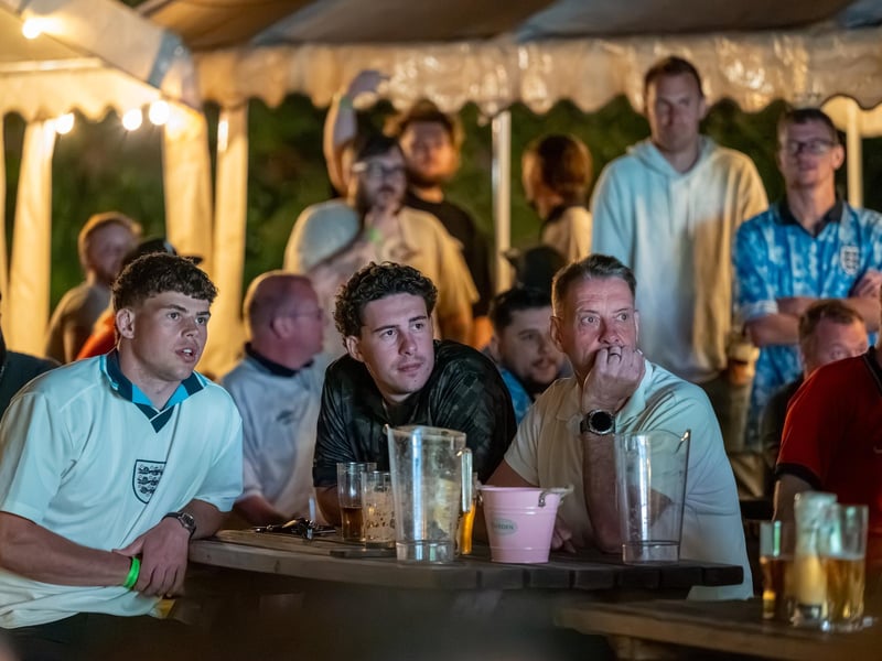 Football fans watching England vs Mexico in the garden of The Black Prince in Northampton. Photo by David Jackson.