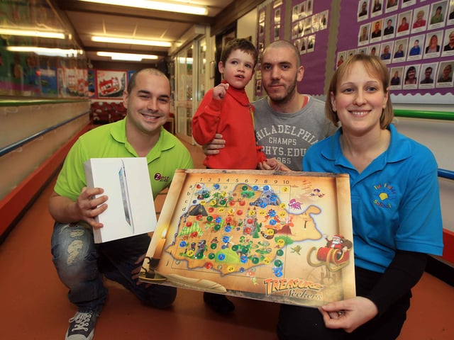 Fairfield School Trinity Av Northampton - raised 2k towards 10k sensory room with a raffle, prizes presented today, Ipad presened by Nick Sheehan to winner Ethan Cameron with LSA Dan Brazier and Teacher Lesley Elder