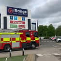 Firefighters were called to The Range in Towcester Road as three people were stuck in a lift.