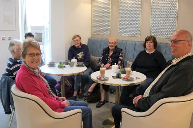 members from the WI, the Baptist church, Thrapston Heritage society and the local community.