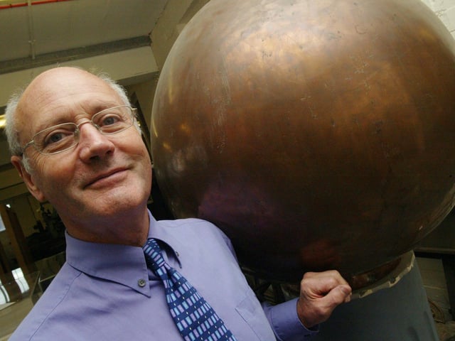 Mike O'Donnell pictured with the globe from the old fountain on market square, currently with The Art and Museum of Northampton on The Guildhall in town. September 29, 2006