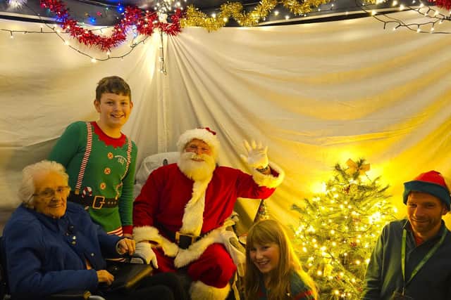 Resident Hilda enjoying her visit to see Father Christmas