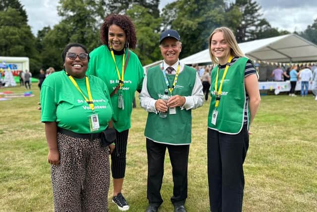 Roger with the St Andrew's Voluntary Services team (from left to right) Camilla Moshoeshoe, Dawn Wri