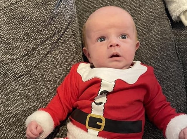 Five-week-old George's first Christmas.