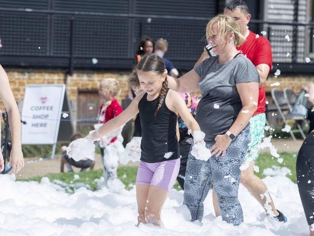 A family-friendly fun run, with water slides and obstacles, took place at Upton Country Park on Saturday (August 12) to raise funds for a Northampton charity.