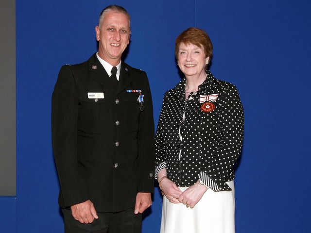 2013 - Northamptonshire Police Long Service awards ceremony takes place at their Headquarters, Wootton Hall, Northampton. Constable Andy Hoyle, presented by Deirdre Newham.