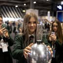A student gets a hair raising experience discovering static energy at the Big Bang Fair
