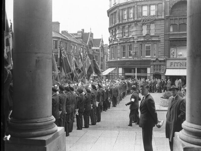 Remembrance parade early 1960s All Saints Church Northampton showing Boots and Gold Street