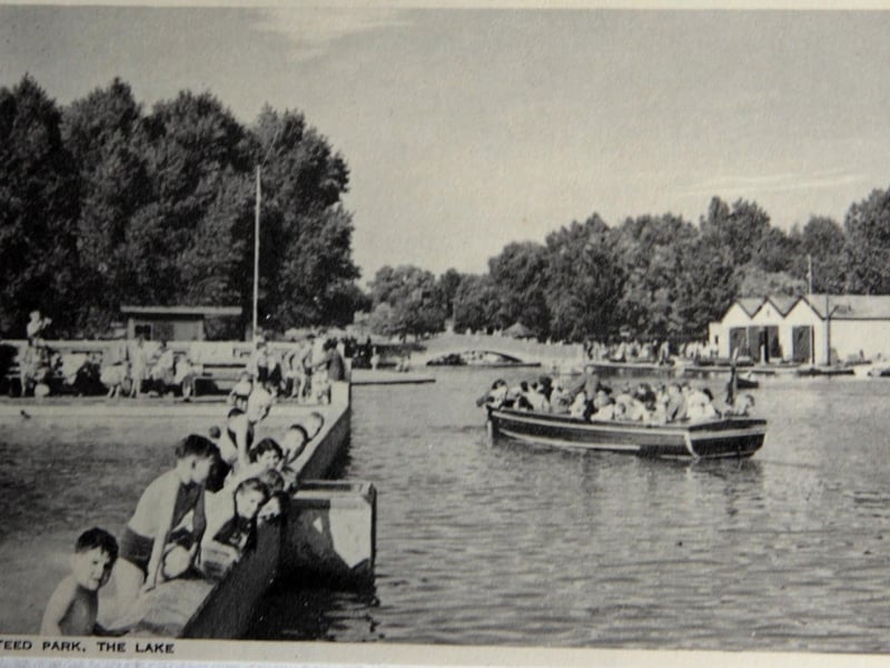 Wicksteed Park postcard of the lake showing children leaning across from the swimming pool