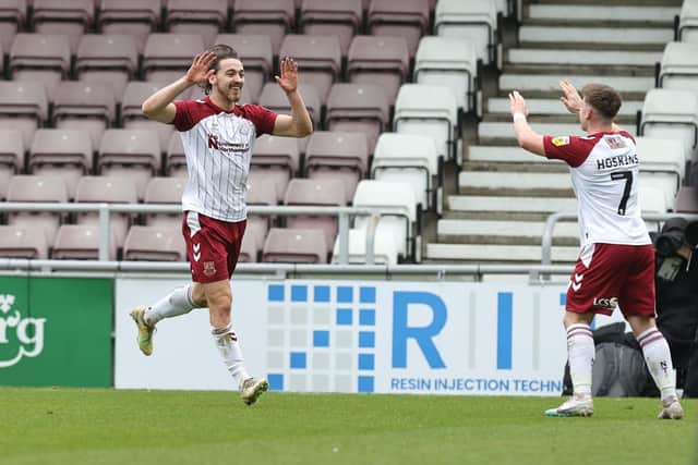 Louis Appere and Sam Hoskins celebrate after the air combined for the only goal of the game against Crewe Alexandra (Picture: Pete Norton)