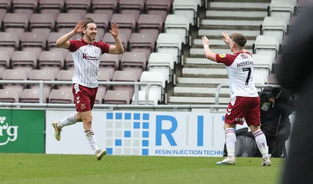 Louis Appere and Sam Hoskins celebrate after the air combined for the only goal of the game against Crewe Alexandra (Picture: Pete Norton)