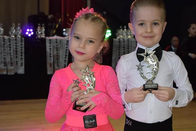 Alex & Melissa - a dynamic duo bringing grace and passion to the dance floor.