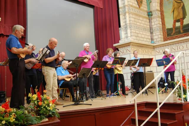 There were demonstrations from many of the groups, including tai chi, country dancers, ballroom dancers, ukulele, and the musical performing group on recorders. Pictured here are the ukulele performers.