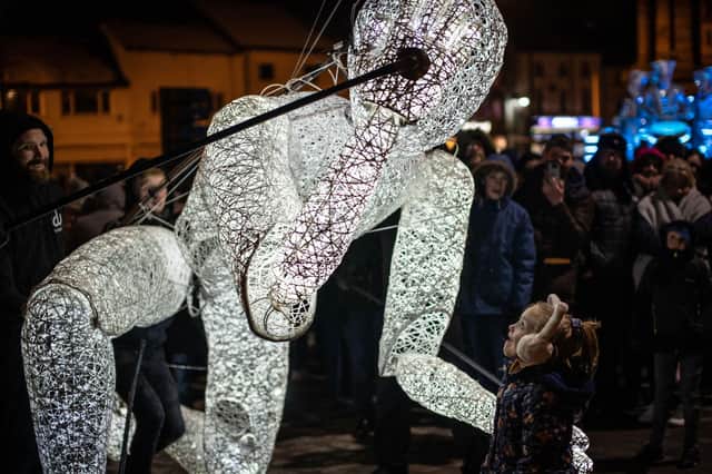 Meeting Dundu, a giant, illuminated puppet, was a moment of wonder for this little girl. See him and many other spectacular artistes and installations at Sutton's first Light Night this weekend