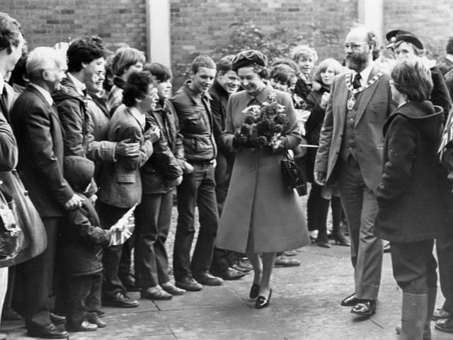 The Queen in the Corby for the naming of Queen Elizabeth School