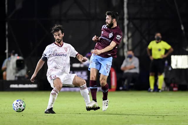 Jack Price (wearing No.19) in action for Colorado Rapids (photo by Emilee Chinn/Getty Images)