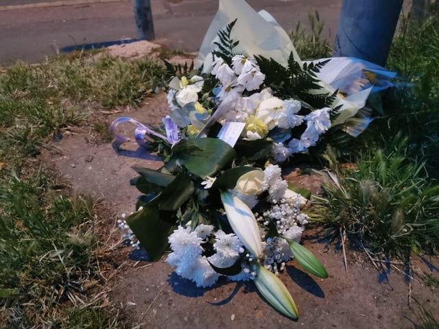 Several floral arrangements and notes were left at the scene in Semilong park after the fatal stabbing on Thursday July 18.