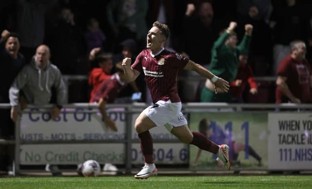 Sam Hoskins celebrates after scoring a stoppage-time equaliser against Lincoln City at Sixfields. (Photo by Pete Norton/Getty Images)