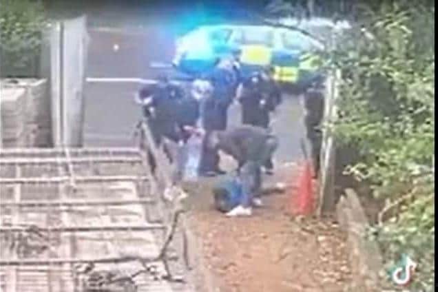 Footage captured the arrest and large police presence