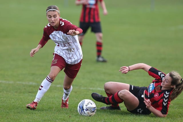 Gracie Williams goes past Dronfield's Eleanor Rose