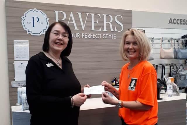 Verana Yates (left) and Helen Forskitt (right) at Pavers Northampton with the donation cheque.