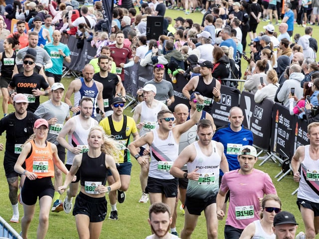 Hundreds of runners braved showers and wind to take on the race on Sunday (May 25), which started and finished at Sixfields stadium.