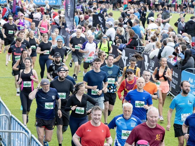 Hundreds of runners braved showers and wind to take on the race on Sunday (May 25), which started and finished at Sixfields stadium.