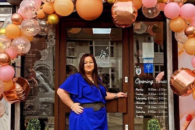 Owner, Joanna, celebrating her salon's one year anniversary.