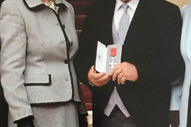 Doreen &amp; Peter - being awarded the MBE for Services to the Boy Scouts and to Industry