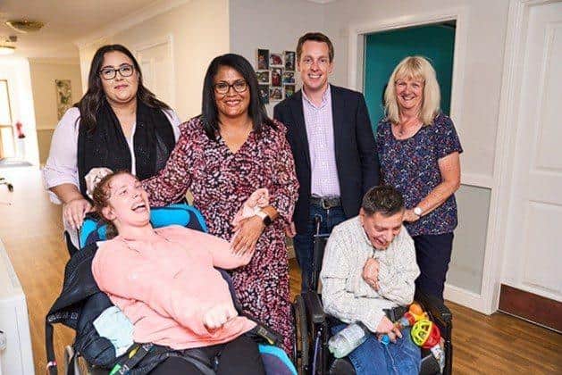 Tom Pursglove speaks with staff at Voyage Care
