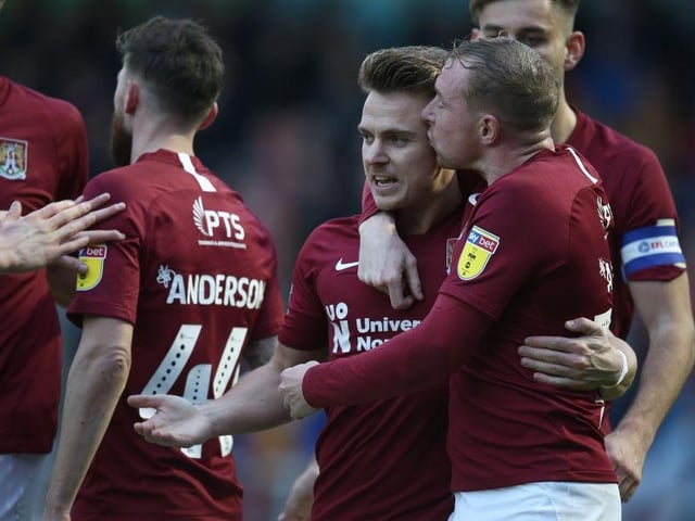 Hoskins would top score for Cobblers in 2019/20, scoring 12 goals en route to promotion. He gets a kiss from Nicky Adams for his goal against Crewe here.