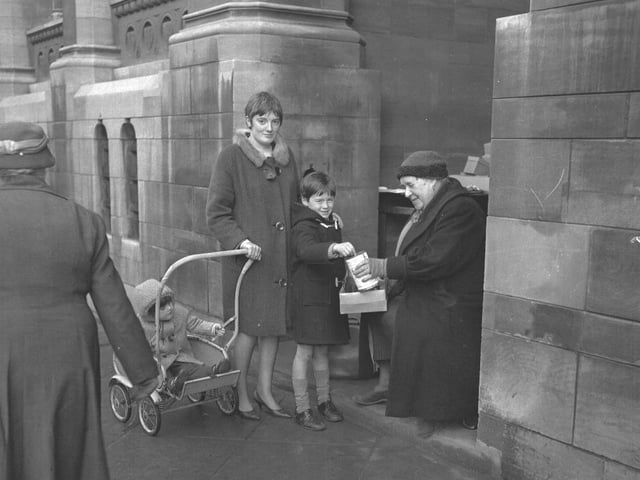 Poppy seller outside Northampton Guildhall 1967-ish