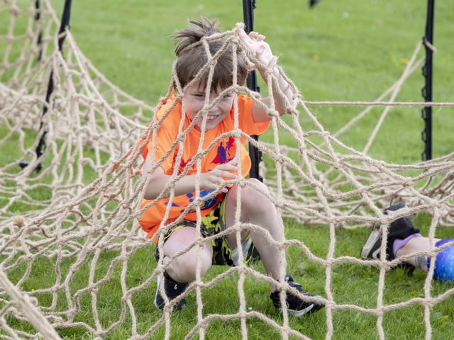 A family-friendly fun run, with water slides and obstacles, took place at Upton Country Park on Saturday (August 12) to raise funds for a Northampton charity.