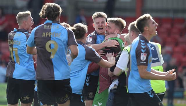 JUBILATION! Cobblers snatched a point at Crewe on Saturday. Pictures: Pete Norton.