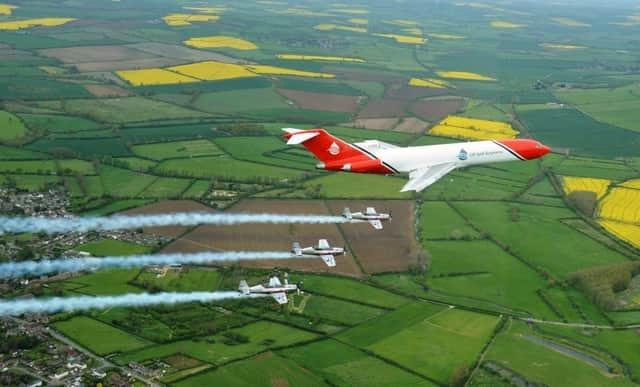 The Blades flying with a boeing 727 as part of an industry day in 2015. Readers saw the planes flying from Sywell towards Corby.