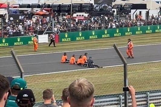 Just Stop Oil protesters breached a massive security operation and sat on the 200mph Wellington Straight at Silverstone during the British Grand Prix in July 2022.
