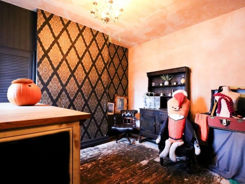 The first floor includes a large dining room that can be used for a variety of purposes