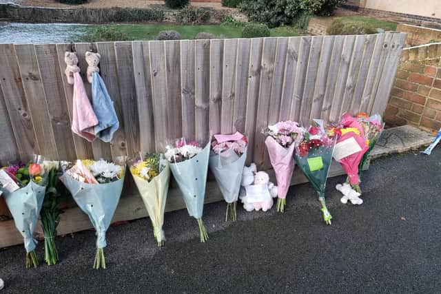 Floral tributes left at the scene
