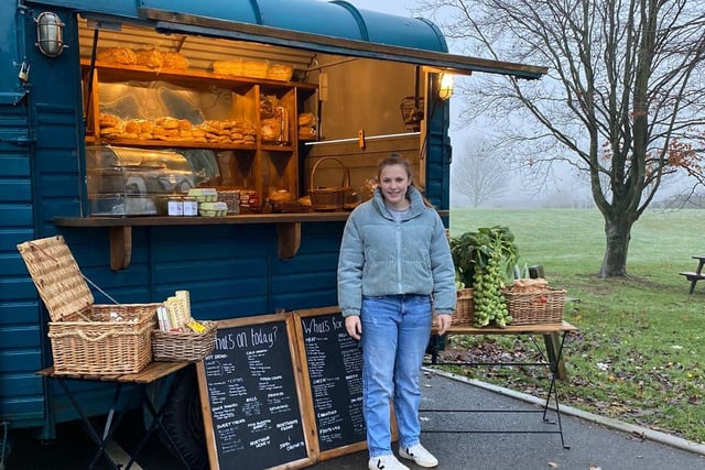 Pippa Reeve pictured in front of her converted horse trailer she bought back in April 2021.