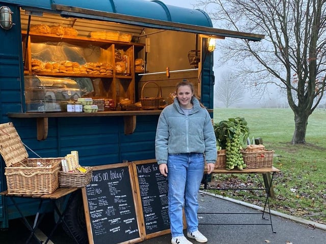 Pippa Reeve pictured in front of her converted horse trailer she bought back in April 2021.