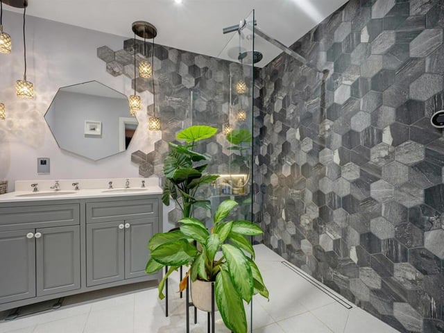 Take a look at one of the house's five modern and stylish bathrooms.