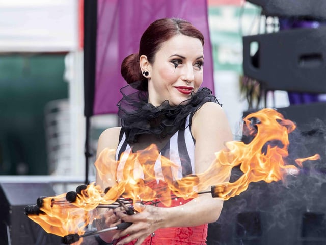 Hundreds enjoyed music, circus acts, and memories from the decade during a sixties celebration event in Northampton's Market Square on Saturday (September 24).