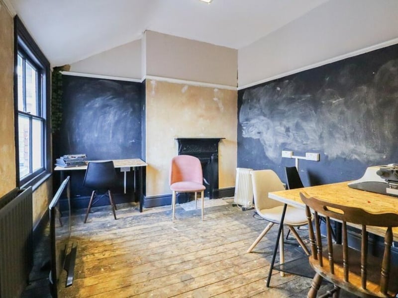 The upstairs boasts another room which could be used for storage or other preparatory work