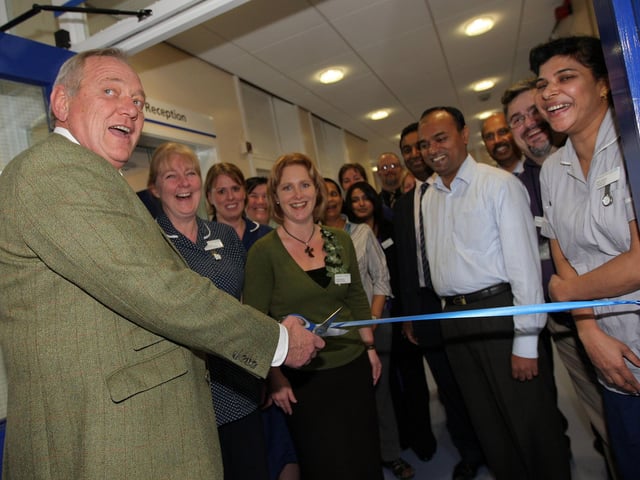2009 - Dr John Hickey, chairman of Northampton General Hospital Trust, cutting a ribbon to officially open the newly renovated eye department at Northampton General Hospital.