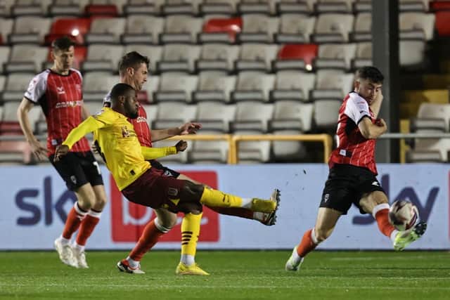 Tariqe Fosu fires the Cobblers into an early lead at Lincoln (Picture: Pete Norton)