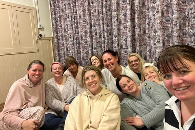The 'purple ladies' of Harpole Preschool at their sponsored sleepover on Friday November 18, 2022.