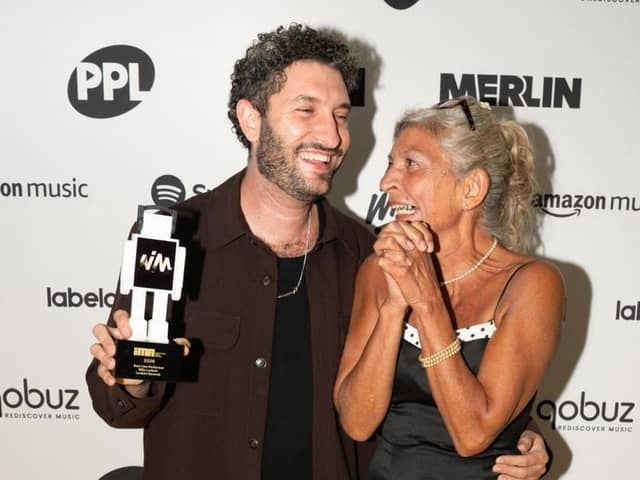 Billy Lockett and his mum at with his award.